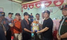 Wabup Bolmong Serahkan Bantuan untuk Korban Puting Beliung di Tapadaka